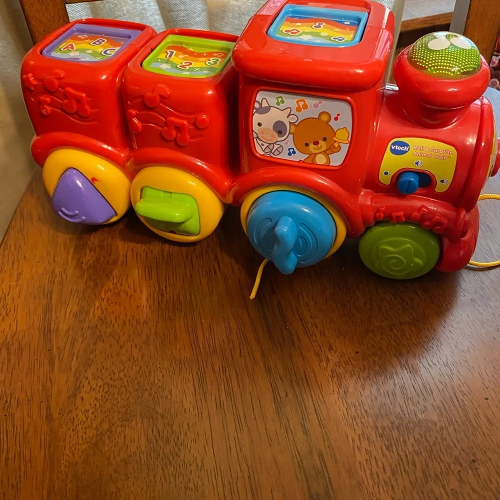 VTech roll and surprise animal train.